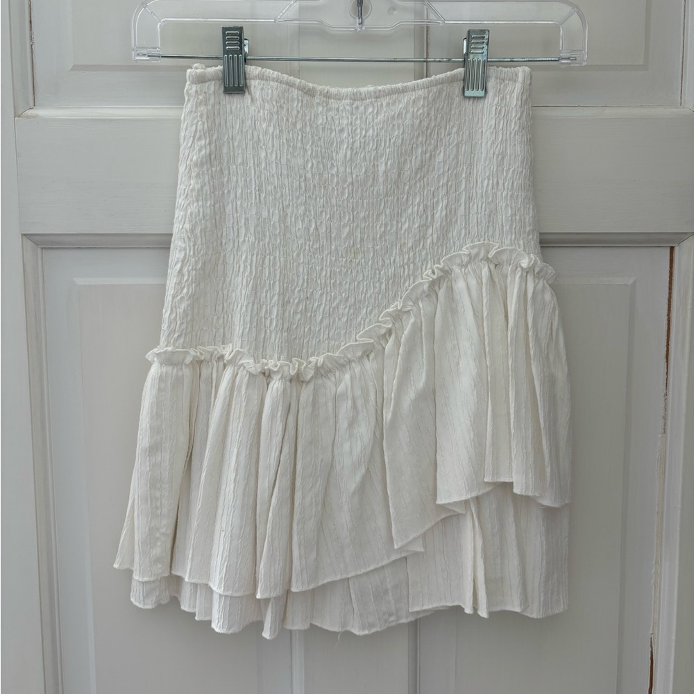 White ruffle mini skirt